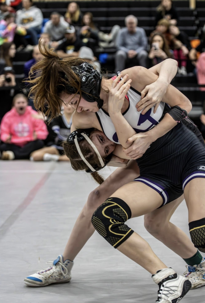Madison takes down opponent. 