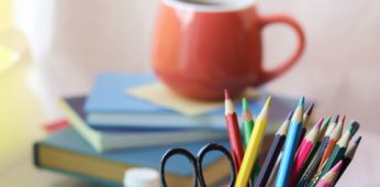 School stationery, books on the table, home schooling concept